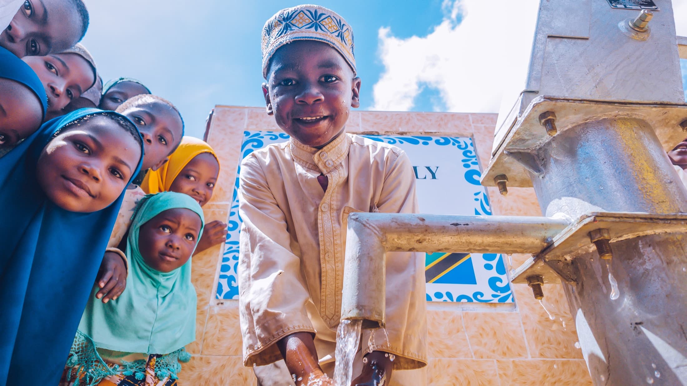 Children gathered at a community water point
