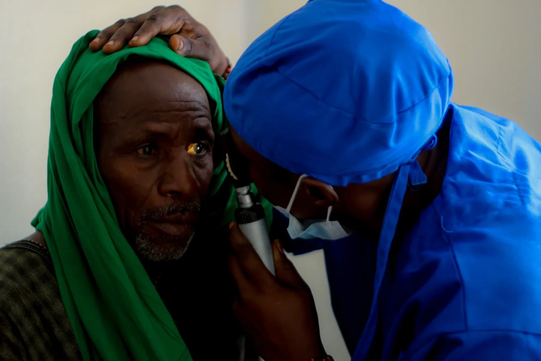 A patient receiving an eye examination