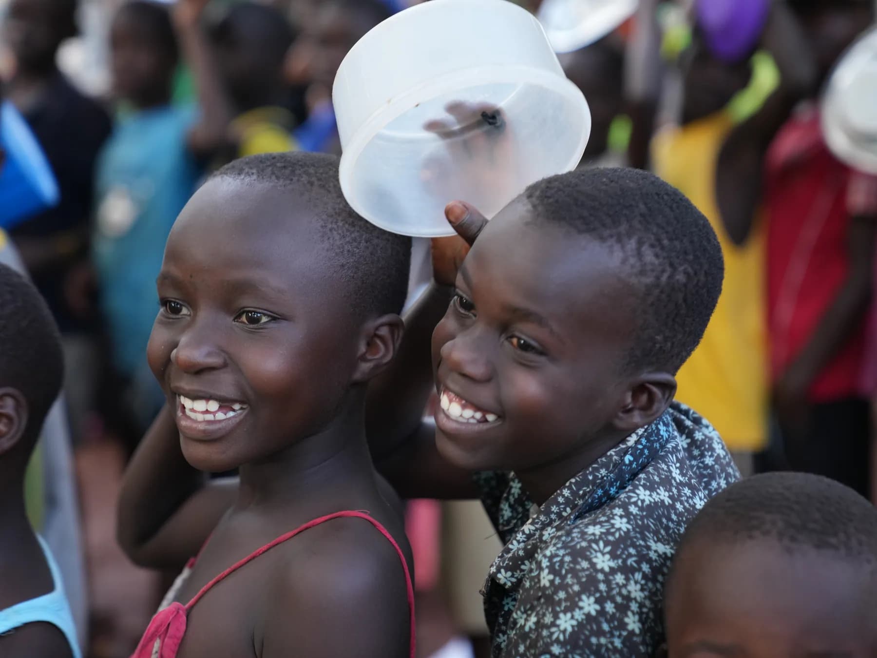 Children together at an Embrace Relief partner community