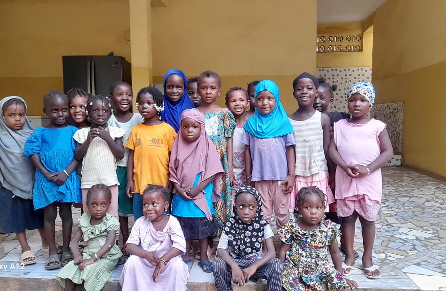 Girls standing together at Djiguiya Bon Orphanage in Bamako, Mali