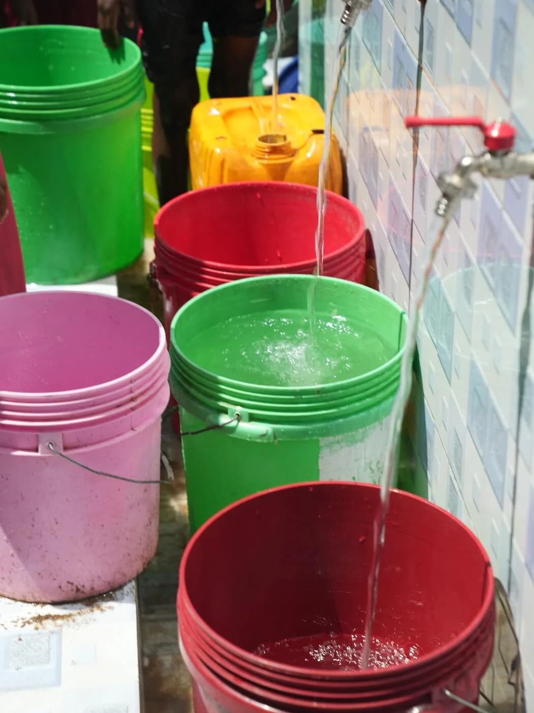 Buckets filling with clean water