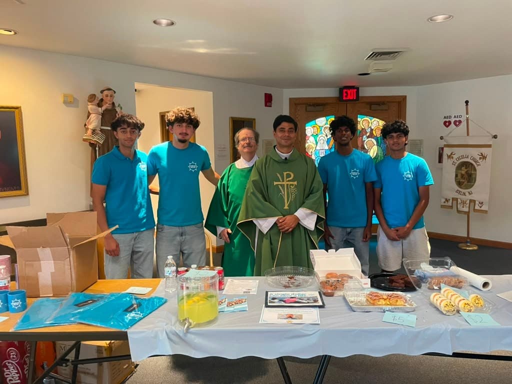 Faith, Generosity, and Service: Embrace Relief Visits Saint Cecelia Church