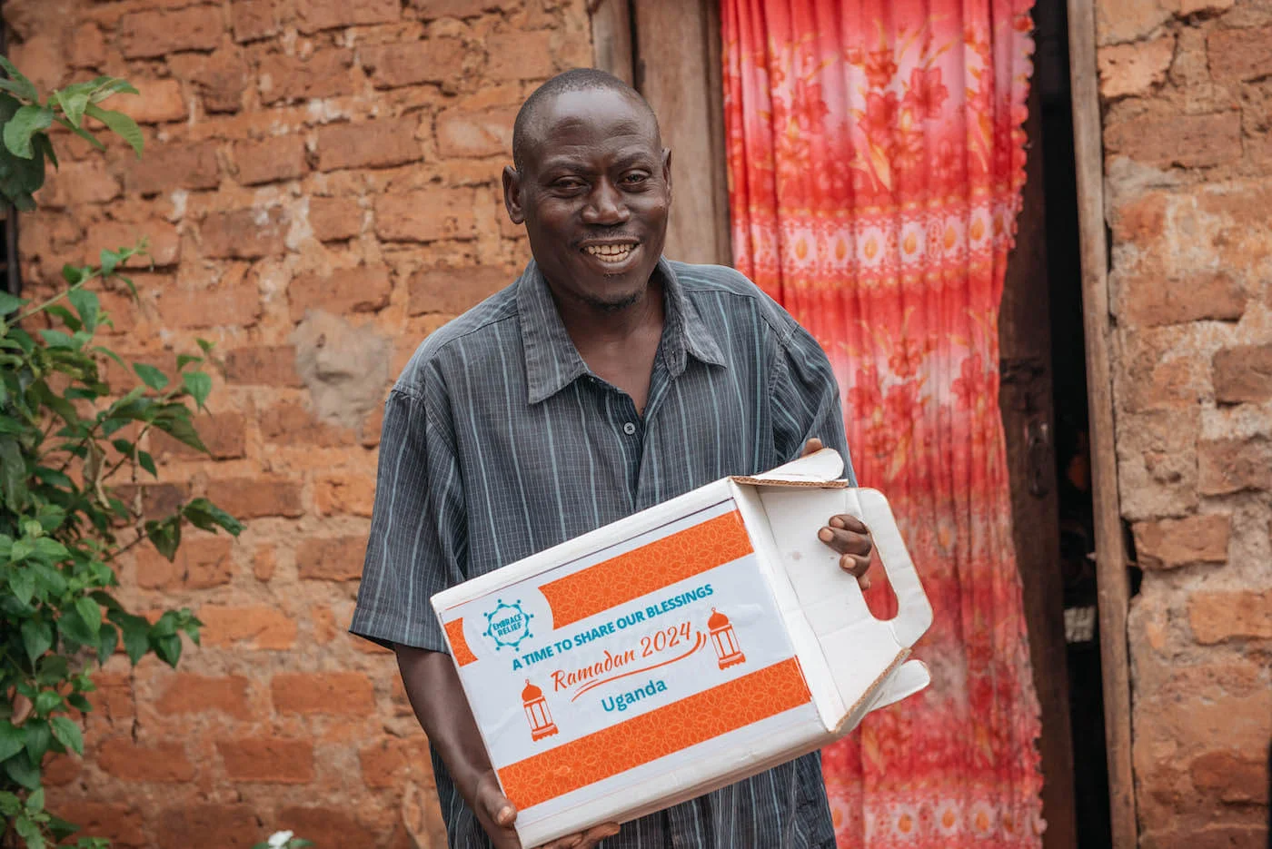 Volunteers distributing food packages for Ramadan charity