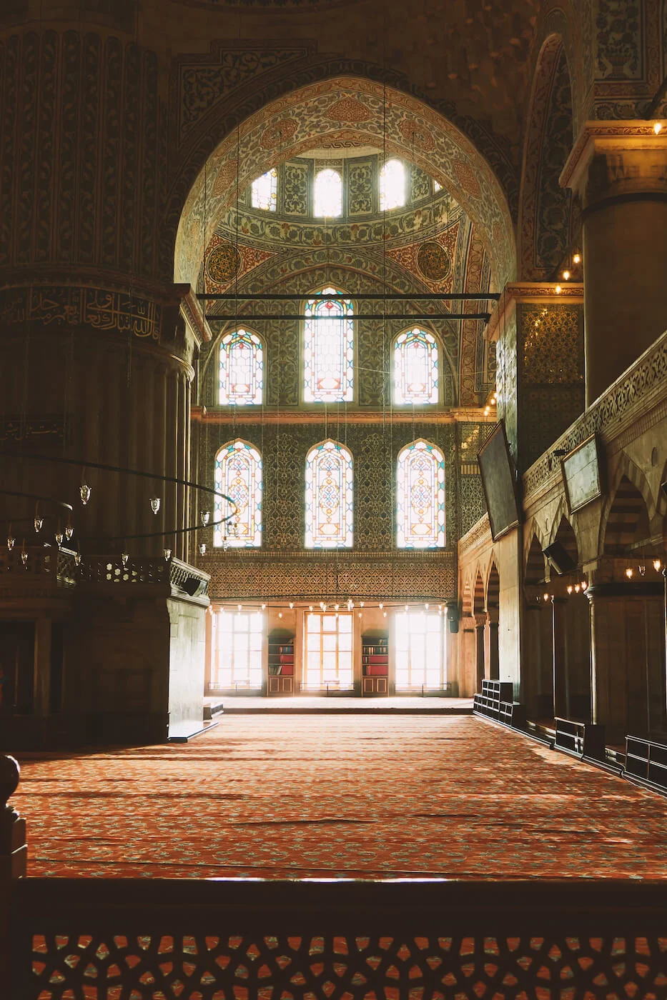 Interior view of the Blue Mosque in Istanbul showing historical architecture and lighting