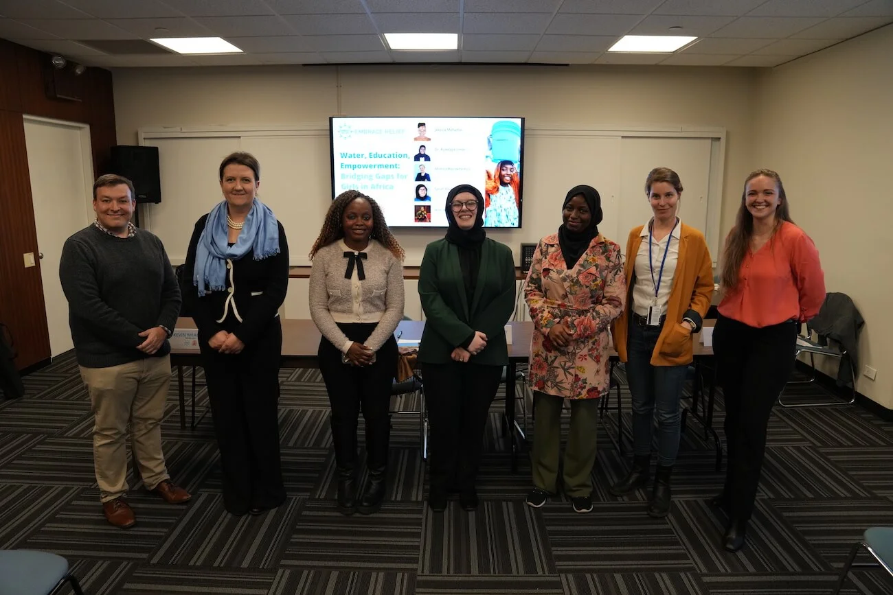 Panelists speaking at the Embrace Relief discussion on women's empowerment