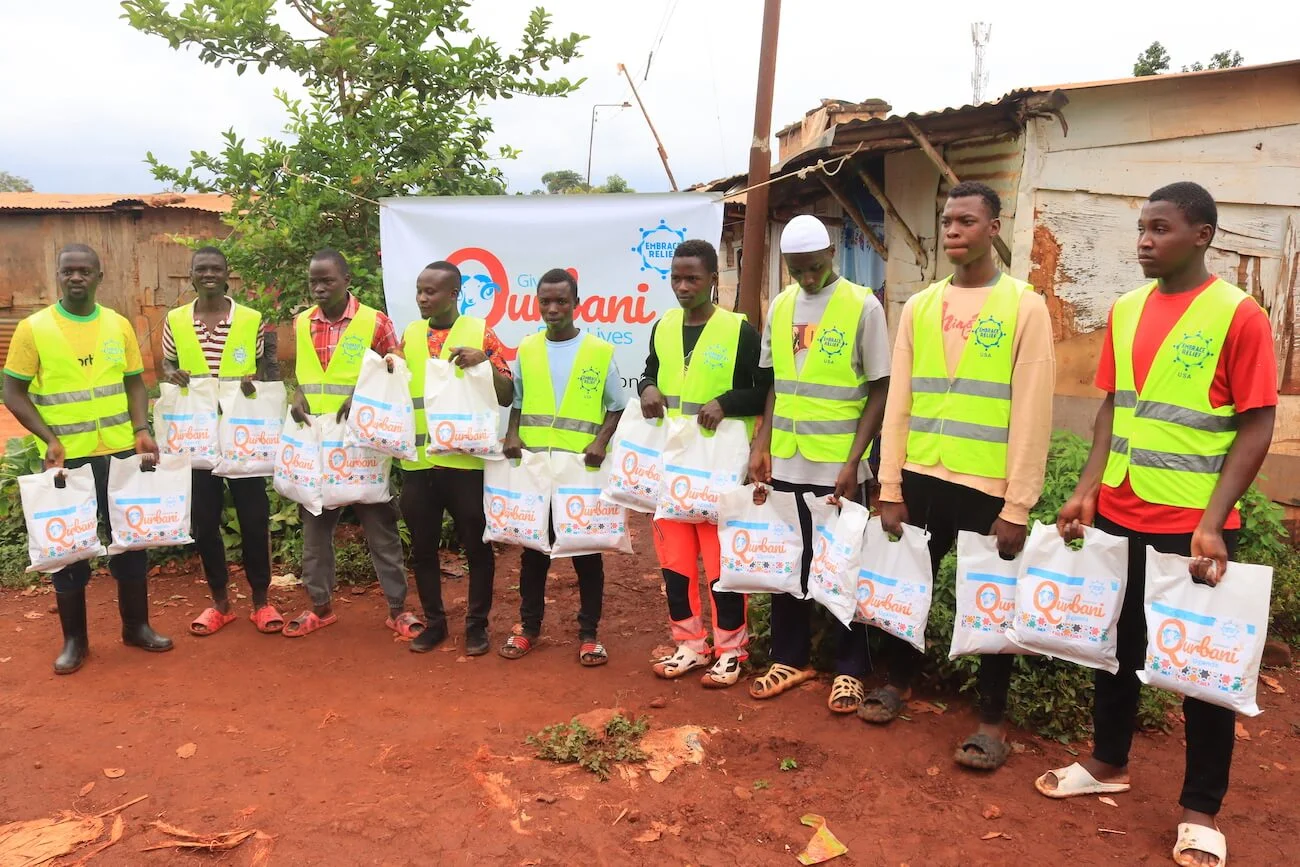 Community members receiving Qurbani meat distribution