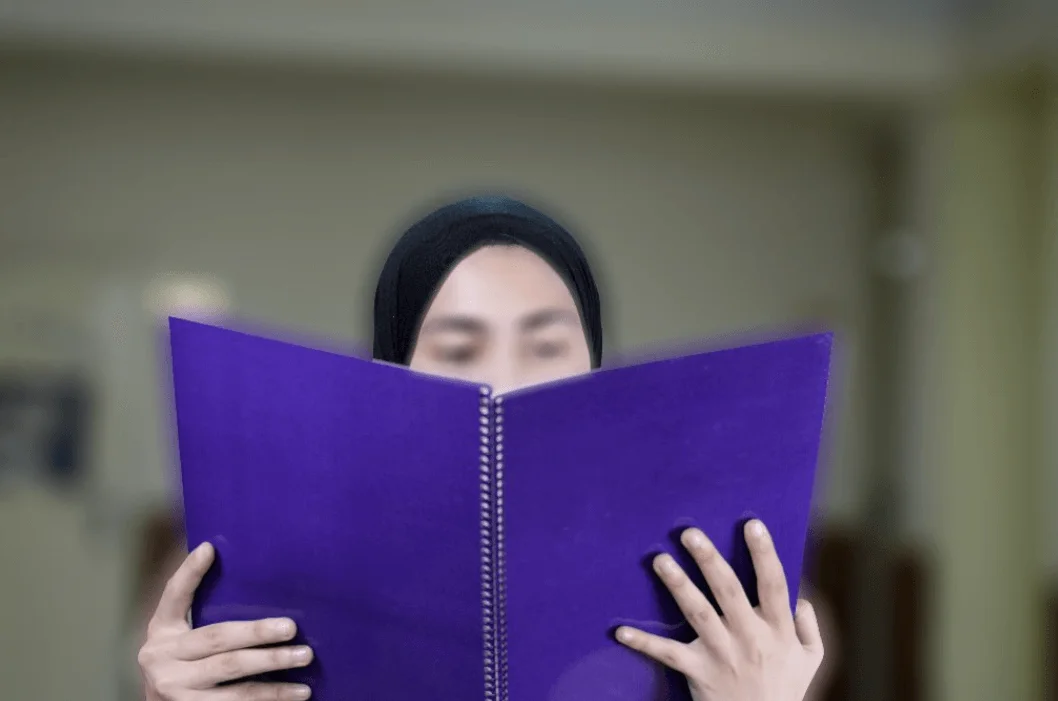 Student studying at a desk to prepare for the new school year