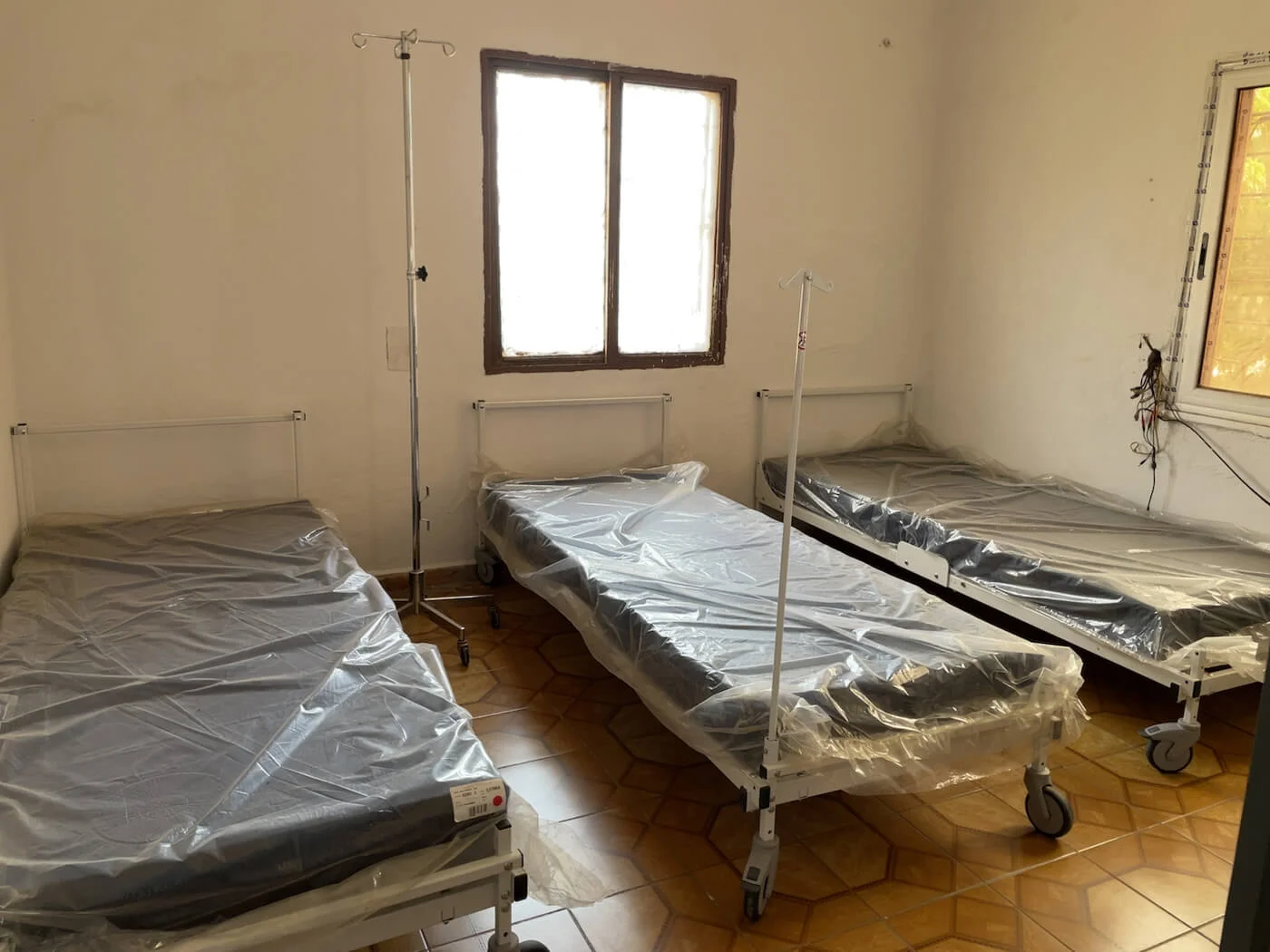 Clinic staff working with medical equipment