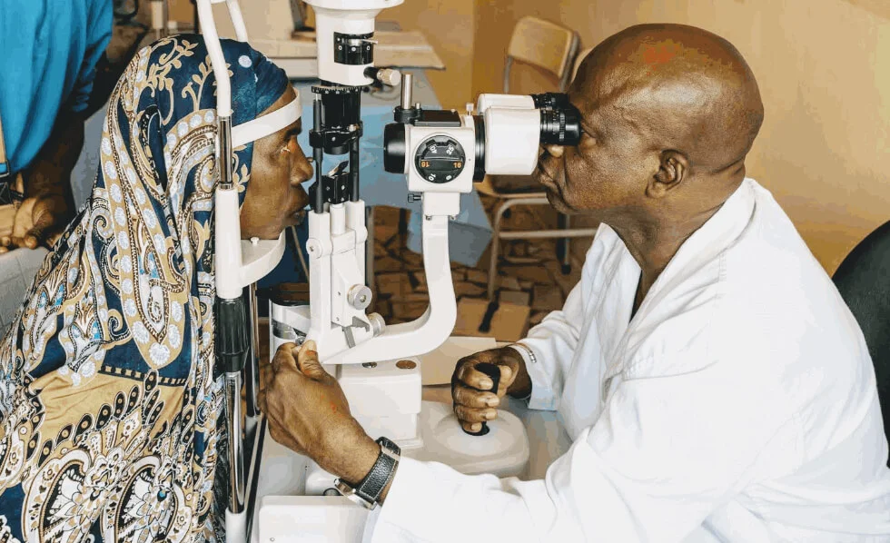 Medical professional examining a patient's eye health