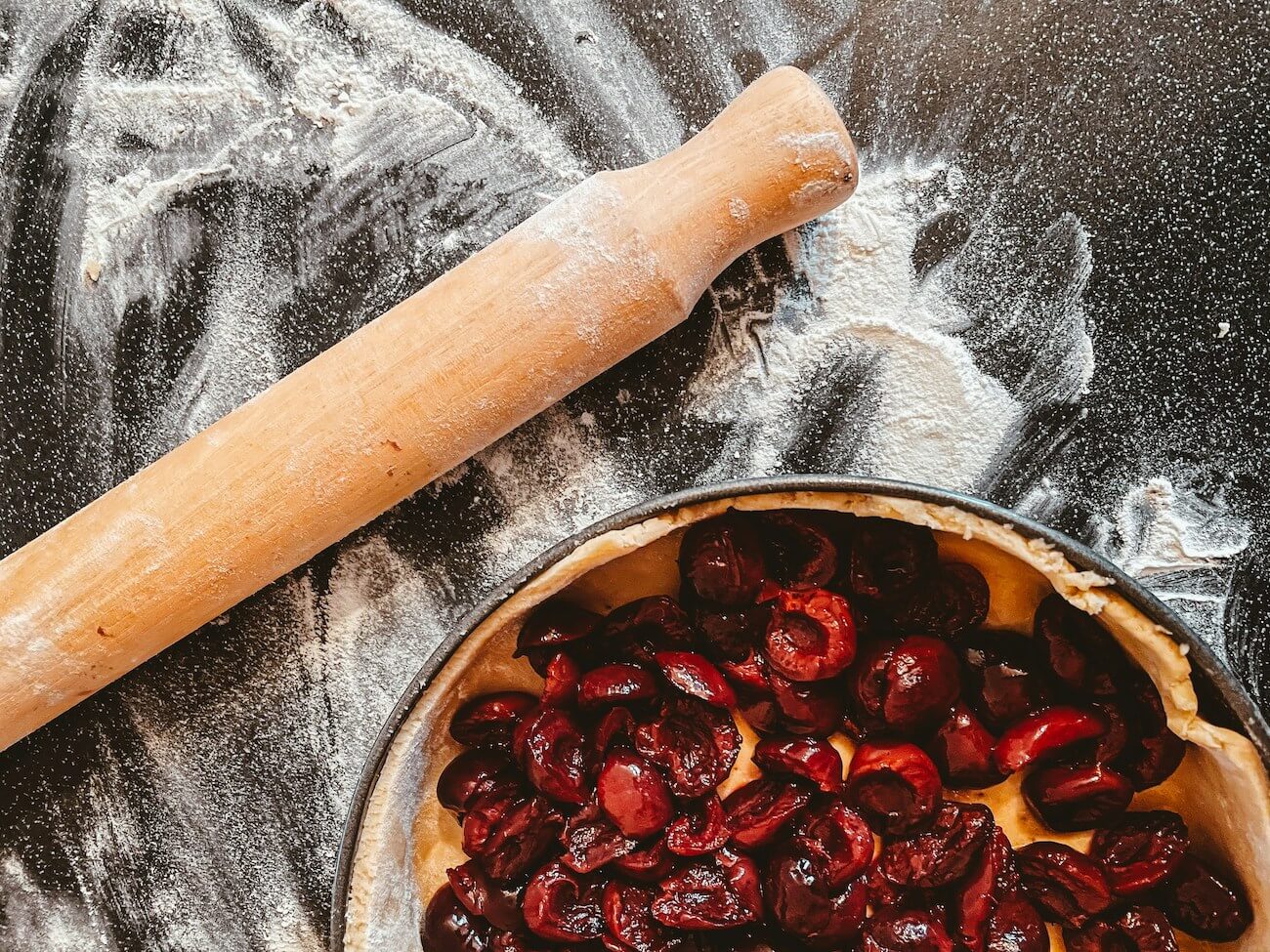 Hands creating autumn-themed crafts and decorations during a workshop