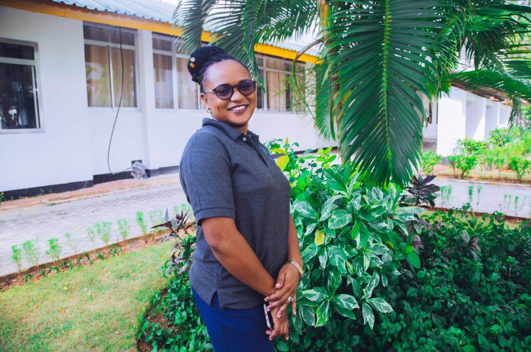 Woman educator in Tanzania supported by the R.I.S.E. program