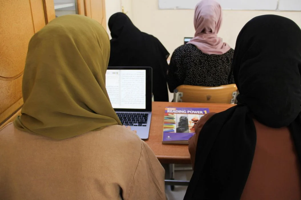 Afghan girls participating in the L.E.A.R.N. program online education