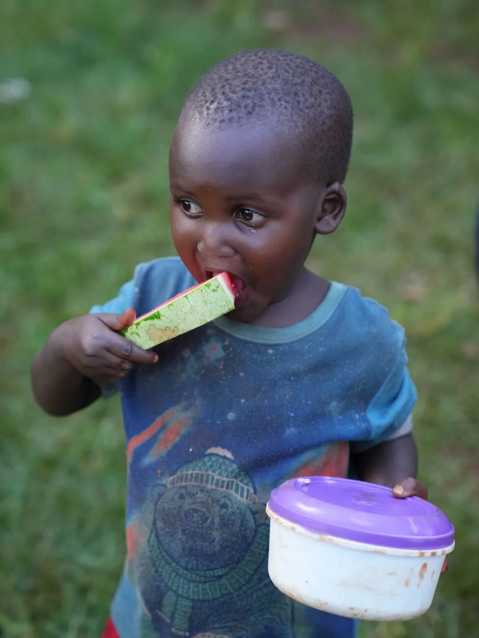Children receiving support through Embrace Relief's Orphan Care Program