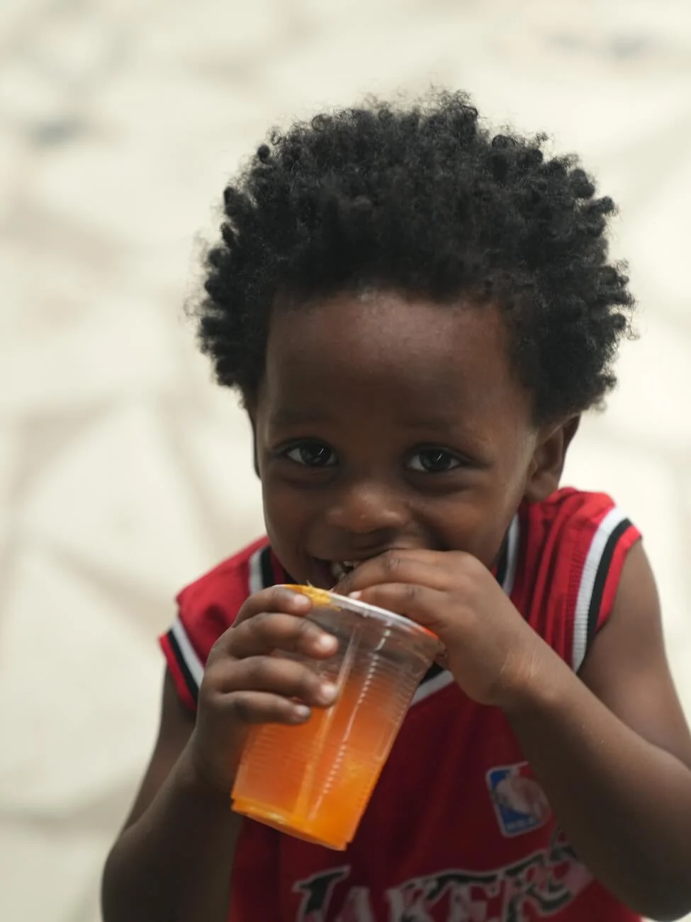 Children receiving support from Embrace Relief in Africa