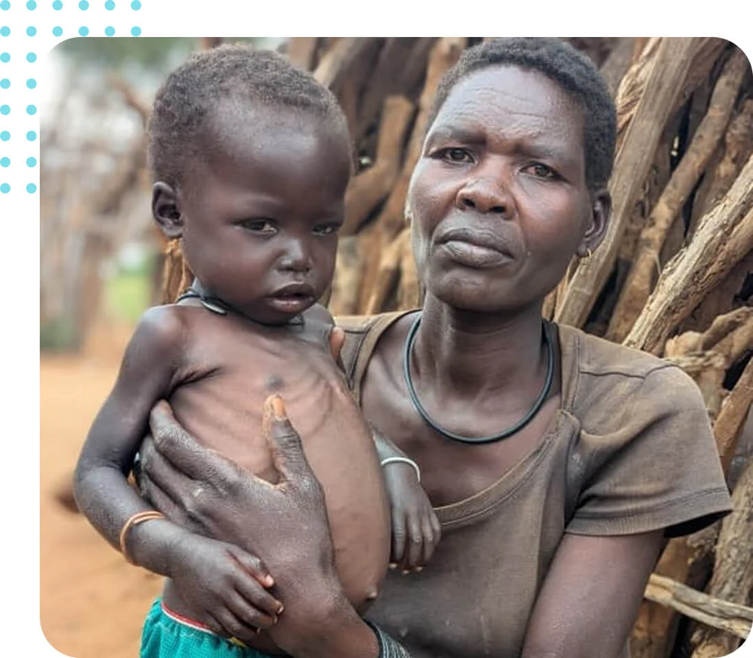 Community members receiving food aid in Karamoja