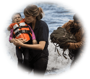 Refugee family receiving aid in Greece