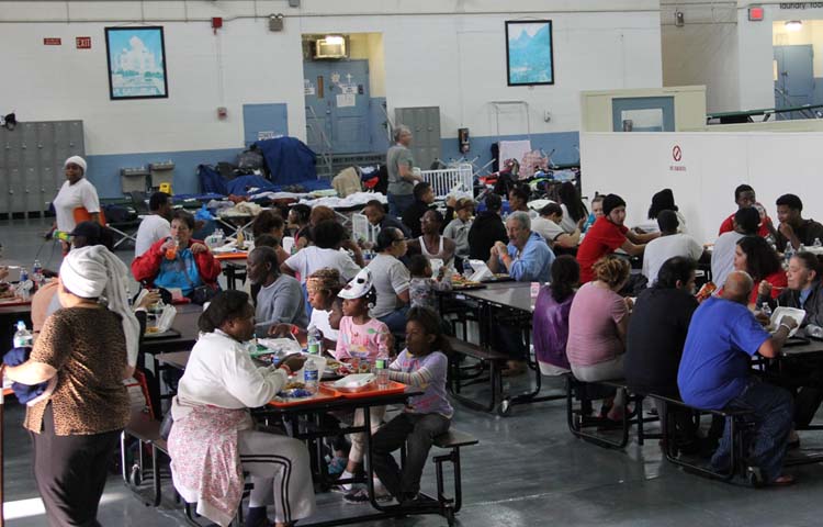 Volunteers distributing food and supplies to Hurricane Sandy victims