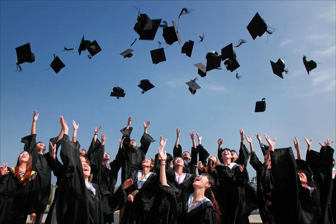 Students celebrating graduation achievements