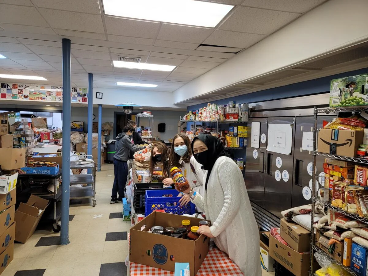 Sky Academy students participating in the food drive