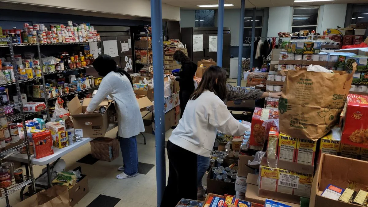 Community members receiving holiday food assistance