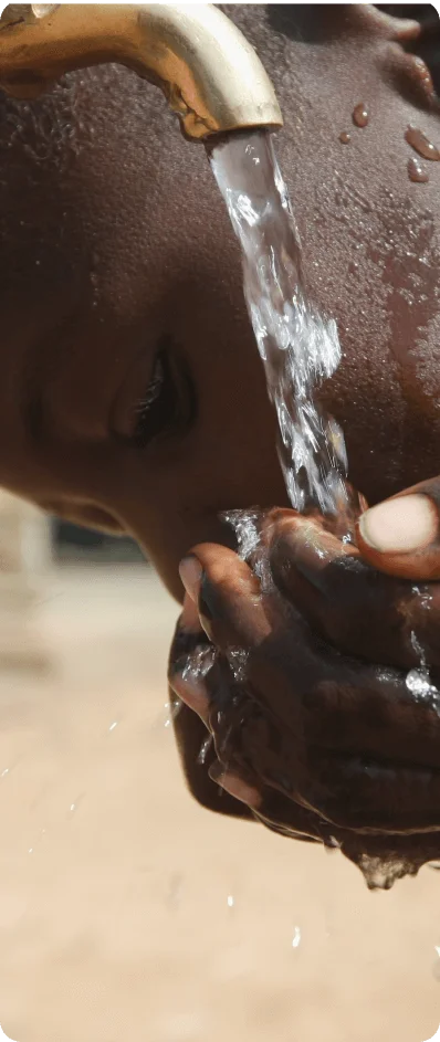 Community gathering around a new water well
