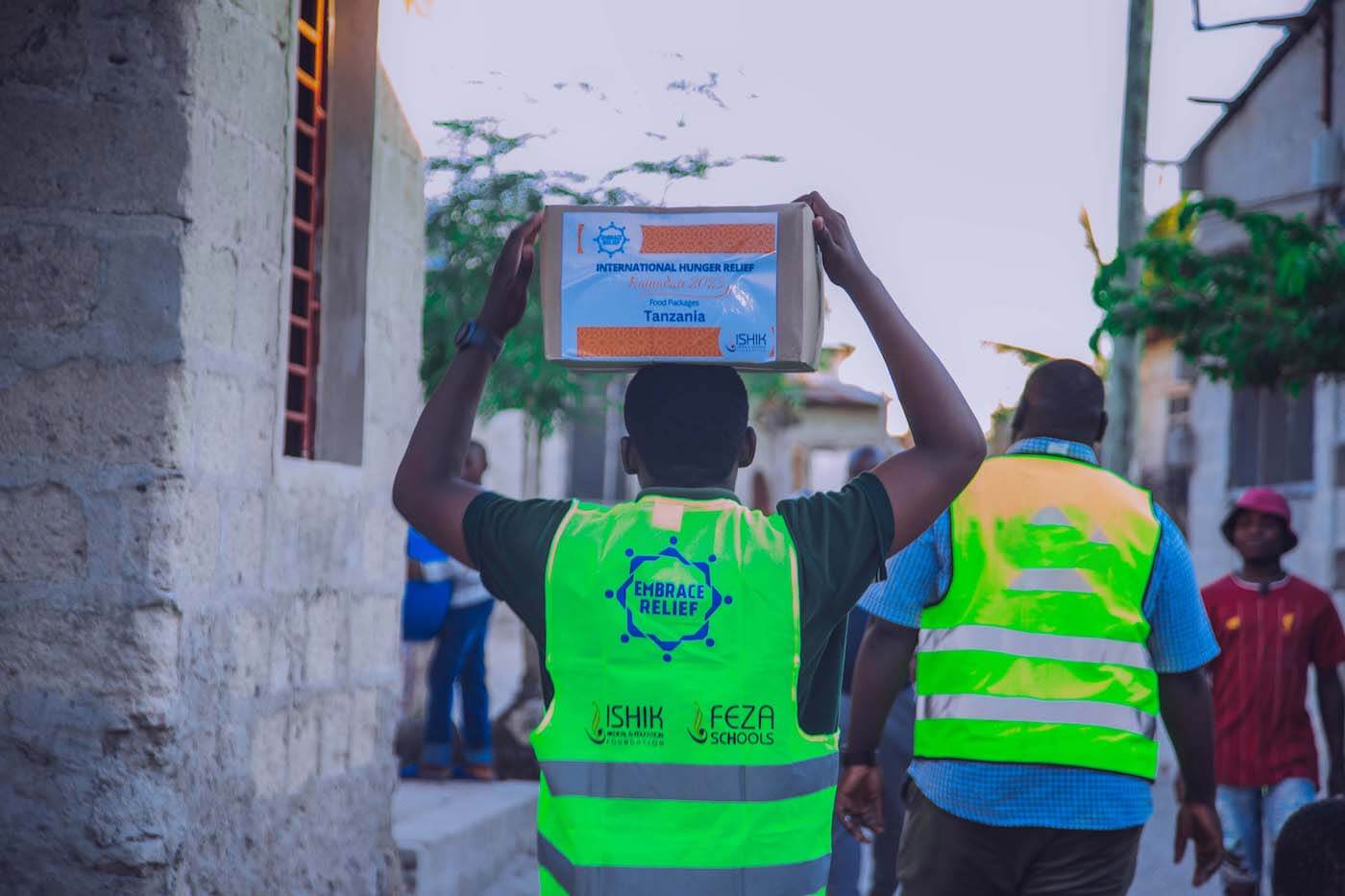 Community members receiving food aid and support