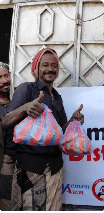 Community members receiving food assistance packages