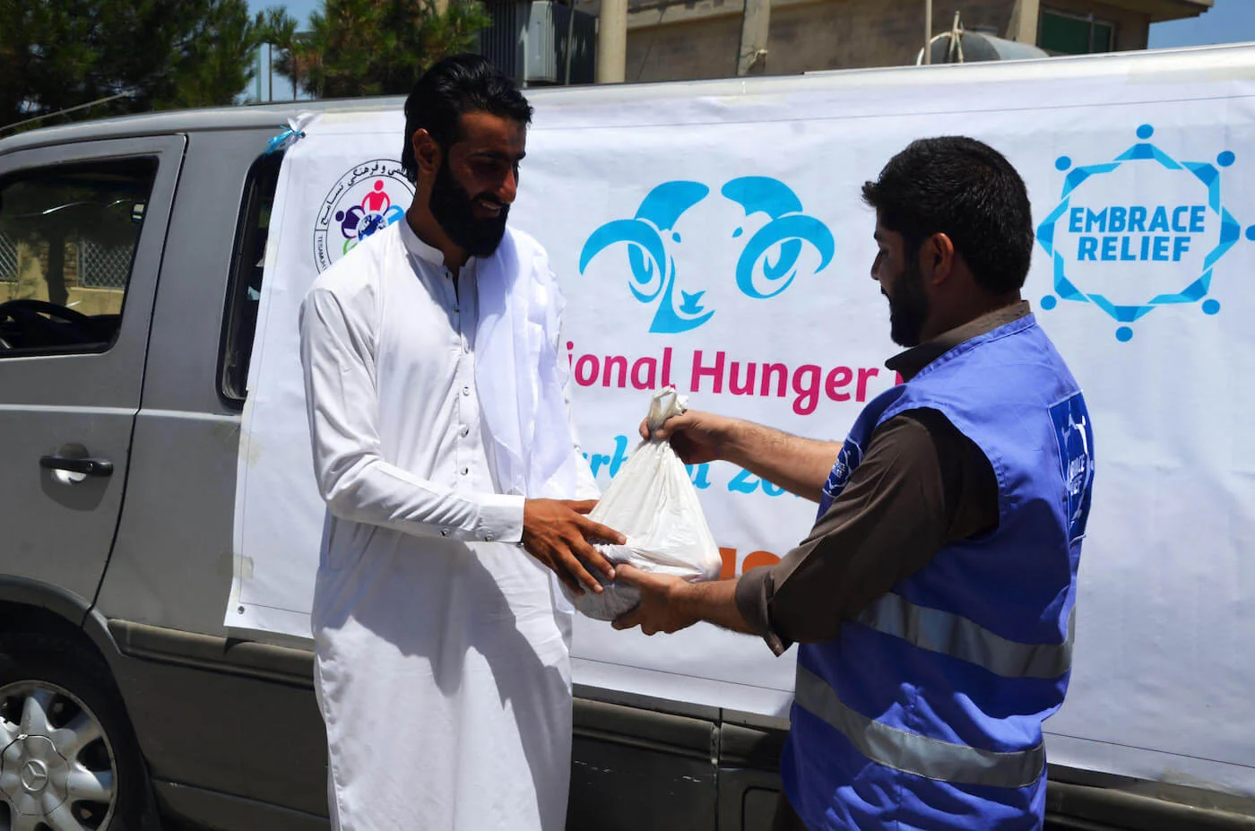 Volunteers distributing food packages during Hunger Relief 2022