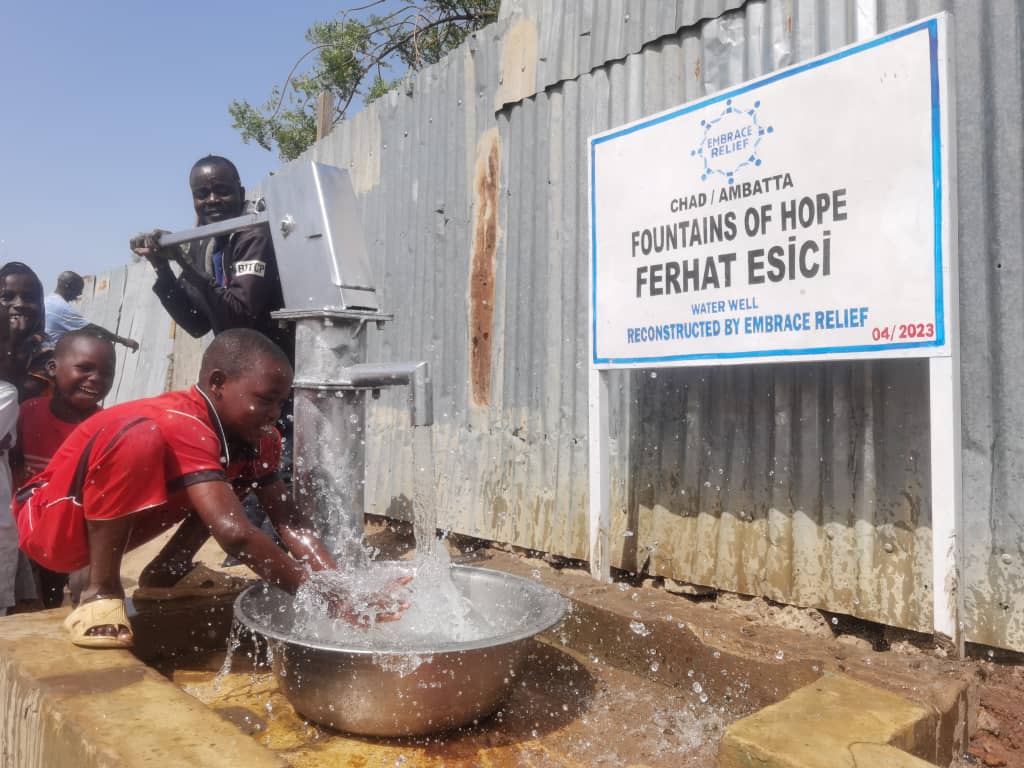 Restored water well providing clean water in Africa